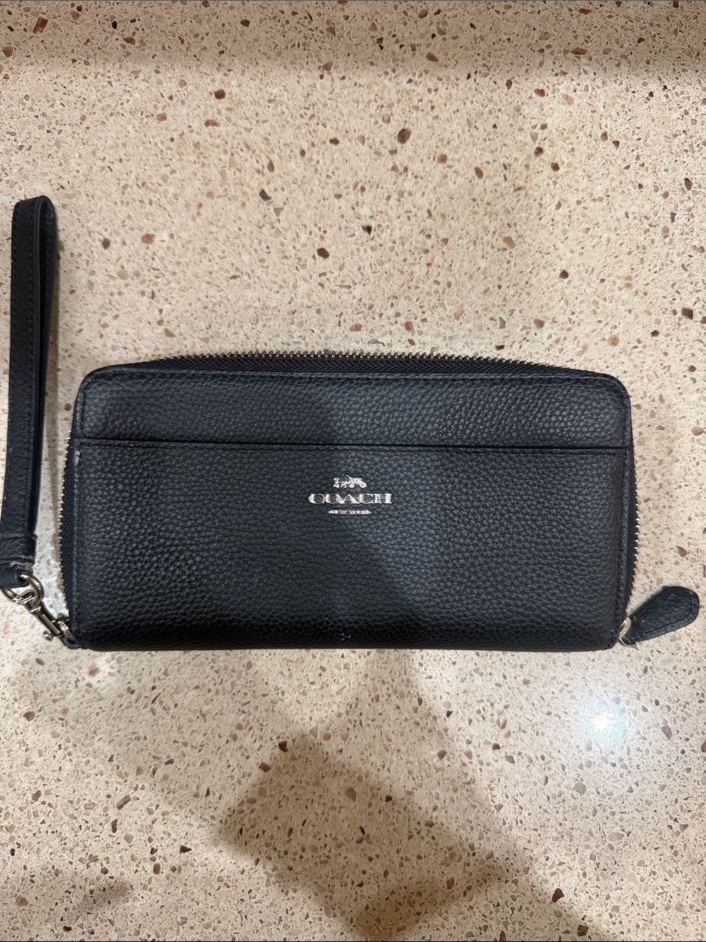 Coach Accordion zip wallet Black Pebbled Wristlet-small blemish.  Pic attached.